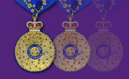 Order of Australia medals on a purple background